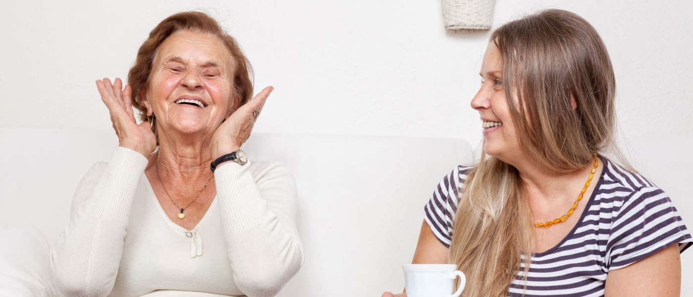 Happy women drinking tea